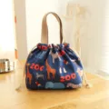Japanese style waterproof bento lunch bag with cute animal print and convenient drawstring. - Blue Zoo Drawstring Lunch Bag