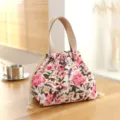 Japanese style waterproof drawstring lunch bag with cute pink floral pattern and sturdy handles. - Beige Flower Drawstring Lunch Bag