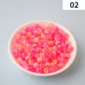 Primo piano dettaglio di perline acriliche crepate bicolore rosa e arancione per gioielli. - 2#