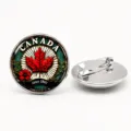 Vintage Canada maple leaf glass cabochon brooch with stainless steel pin back details - White