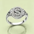 Vintage silver hip-hop dollar sign ring featuring intricate pavé stones and ornate cutouts - 7 / Silver