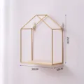 Minimalist gold metal house-shaped wall shelf with a light wooden base for storage - 20x10x25cm