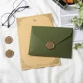 Vintage avocado green envelope and kraft paper stationery set with wax seal stamp detail. - 1 Olive Green Envelope + 1 Kraft Rabbit Paper + 1 Wax Seal Stamp