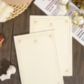Vintage lined writing paper detail shot, retro stationery pad with elegant floral border design. - 100pcs A5 Gold Rose Writing Paper