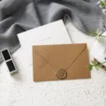 Detailed shot of elegant burlap texture envelope, wax seal stamp and message greeting card. - Love You 1 Set