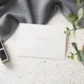 White textured greeting card featuring love you gold print for special holiday moments. - Love You Single Card