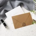 Detailed view of burlap textured greeting card envelope with wax seal for special occasions. - All The Best 1 Set