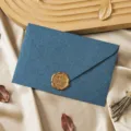 Vintage blue textured paper envelope with golden wax seal for romantic letters close-up detail. - 1 Cashmere Royal Blue Envelope & 1 Wax Seal