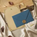 Vintage stationery detail showing kraft paper, blue envelope, and golden wax seal. - Cashmere Royal Blue: 3 Envelopes + 10 Kraft Rabbit Sheets + 3 Wax Seals