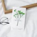 Handgemaakte gedroogde bloemen wenskaart met groen gipskruid en poëtische tekst voor cadeaus. - Sterrenhemel Groen