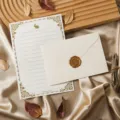 Vintage stationery letter paper and envelope set with golden floral details and wax seal. - Envelope and Letter Paper Set / Off White