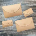 Kraft paper envelopes featuring a unique heart-shaped clasp design, perfect for love letters. - Small Size / Green