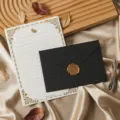 Detailed view of vintage stationery set with letter paper, black envelope and wax seal. - Envelope and Letter Paper Set / Charcoal Black