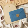 Vintage stationery set with kraft writing paper, blue envelope and gold wax seal decor. - Envelope and Letter Paper Set / Sapphire Blue