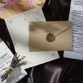 Vintage stationery set featuring retro letter paper, kraft envelope, and elegant wax seal. - Gray Linen 1 Envelope + 1 Letter + Wax Seal