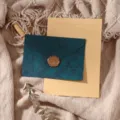 Retro stationery set with textured teal envelope, lined paper and wax seal stamp for gifts. - Dark Green 3 Envelopes + 10 Kraft Lined Papers + 3 Stamps