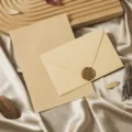 Vintage stationery set with kraft paper envelope, lined letter paper and wax seal stamp detail. - 3 Cashmere Linen Yellow Envelopes + 10 Sheets Lined Kraft Paper + 3 Wax Seals
