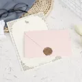 Detailed view of stationery set featuring aesthetic letter paper, pink envelope and wax seal. - 3 Light Pink Envelopes + 10 White Rabbit Letter Papers + 3 Wax Seals / Light Pink