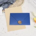 Detailed shot of stationery letter paper envelope set with blue pearlescent card and wax seal. - 3 Navy Blue Envelopes + 10 Kraft Lined Letter Papers + 3 Wax Seals / Navy Blue
