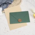 Vintage stationery set with green envelope, lined letter paper and elegant wax seal design. - 3 Dark Green Envelopes + 10 Kraft Lined Letter Papers + 3 Wax Seals / Dark Green