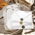 Ensemble de papier à lettres et enveloppes vintage lapin avec bordures dorées pour notes. - 3 enveloppes dorées effet neige + 10 papiers à lettres lapin blanc + autocollants