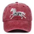 Detailed view of white horse embroidery with floral patterns on a washed red cotton cap - Adjustable / Burgundy