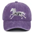 Close-up of purple washed cotton baseball cap with white floral horse embroidery - Adjustable / Purple