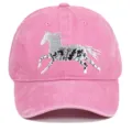 Close-up detail of a pink washed cotton baseball cap featuring an artistic horse embroidery - Adjustable / Pink