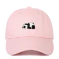 Front view of a pink soft-top baseball cap featuring detailed panda embroidery design - Adjustable / Pink