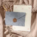 Vintage stationery set with grey textured envelope, wax seal, and lined writing paper for elegant letters. - Grey 3 Envelopes + 10 Rose Gold Papers + 3 Stamps
