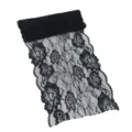 Detailed close-up of black elastic lace trim, showing intricate floral patterns for DIY. - Black