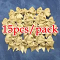Lazos de cinta de satén dorado pack de 15 unidades para decoración de regalos y manualidades. - Dorado