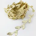 Gold leaf ribbon trim vine for DIY crafts, gift wrapping, and sewing decorations. - Gold