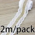 Burlap ribbon lace trim detail shot, rustic jute fabric with white lace for DIY craft sewing. - 1