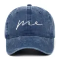 Front view of minimalist washed denim baseball cap with white me embroidery detail - Adjustable / Navy Blue