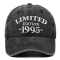 Macro detail of a washed black denim baseball cap with 1995 Limited Edition embroidery - One Size / 1995 Style