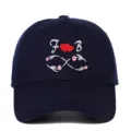 Navy blue cotton baseball cap featuring embroidered F and B with red heart motifs - Adjustable / Navy Blue