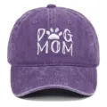 Purple washed cotton baseball cap featuring white DOG MOM embroidery and paw print. - Adjustable / Purple