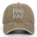 Premium washed khaki cotton baseball cap featuring an embroidered Dog Dad text design - Adjustable / Khaki