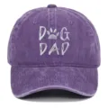 Purple washed cotton baseball cap with silver DOG DAD embroidery and paw print detail. - Adjustable / Purple