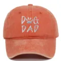 Washed cotton baseball cap in orange with silver DOG DAD paw print embroidery design. - Adjustable / Orange