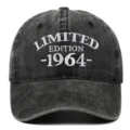 Detailed front view of a vintage washed black denim baseball cap with 1964 embroidery - Adjustable / Black