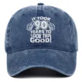 Detailed view of white embroidery on washed navy cotton 90th birthday baseball cap - Adjustable / Navy Blue