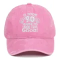 Detailed view of pink washed cotton cap with 90th birthday white embroidered slogan - Adjustable / Pink