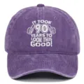 Washed purple baseball cap with 90th birthday embroidery: 'It took 90 years to look this good' - Adjustable / Purple