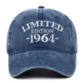 Close-up of washed denim baseball cap with white 1964 limited edition embroidery. - Adjustable / Navy Blue