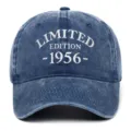Close-up of vintage washed navy blue baseball cap with white 1956 embroidery detail - Navy Blue