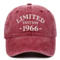 Close-up of 'LIMITED EDITION 1966' white embroidery on a red washed cotton baseball cap - Adjustable / Burgundy