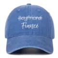 Detailed front view of a vintage blue washed baseball cap with white Fiancé embroidery - Adjustable / Light Blue (Fiance)