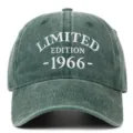 Detailed view of white 'LIMITED EDITION 1966' embroidery on dark green washed cap - Adjustable / Grass Green